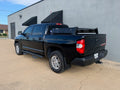 Rear drivers side view of black Toyota Tundra with Overland Bed Rack - Cali Raised LED